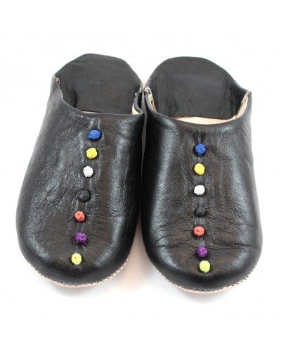 Pom-pom slippers in black leather