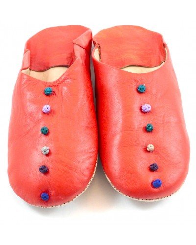 Pom-pom slippers in coral leather